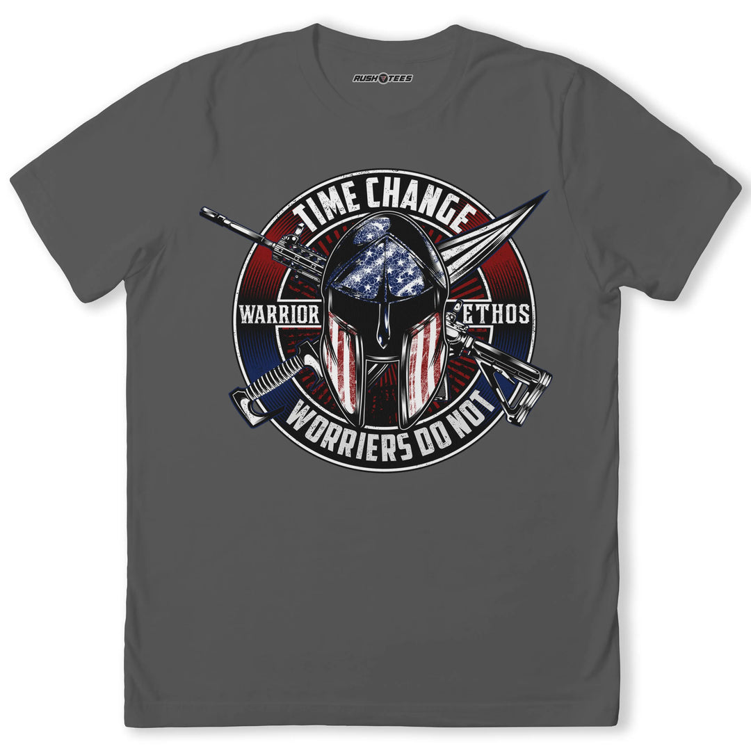 Warrior Ethos T-Shirt featuring a helmet, American flag, and message 'Time Change, Warriors Do Not' on a gray background.