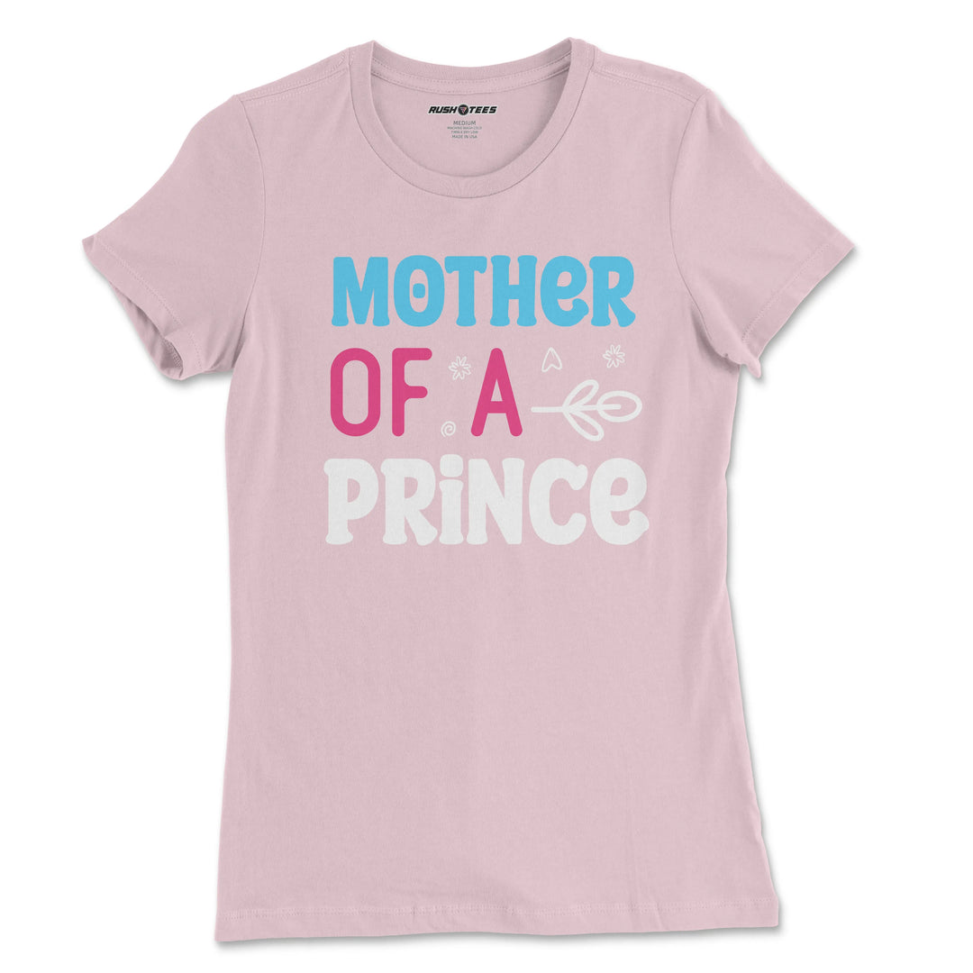 Stylish pastel pink t-shirt with 'Mother Of A Prince' graphic, perfect for Mother's Day and proud moms.