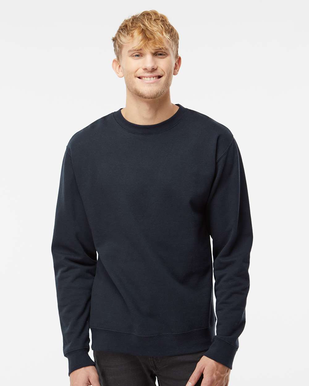 Model wearing a unisex crewneck sweatshirt in navy, showcasing a soft feel and customizable design options.