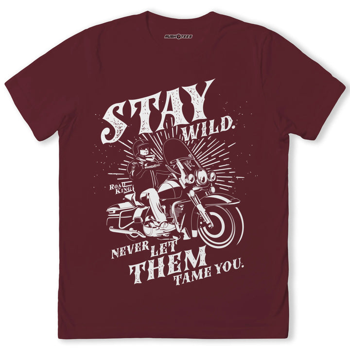 Bold maroon biker t-shirt featuring a motorcycle graphic and the slogan 'Stay Wild, Never Let Them Tame You'.