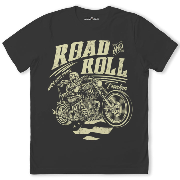 Bold graphic tee featuring a biker on a chopper with vintage 'Road And Roll Freedom' text, perfect for motorcycle enthusiasts.