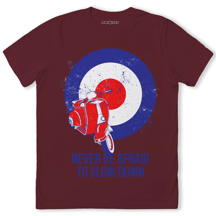 Stylish Mod t-shirt featuring a vintage scooter and target design with the quote, 'Never Be Afraid to Slow Down.'
